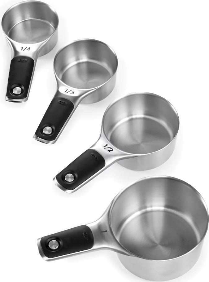 oxo-good-grips-set-of-4-stainless-steel-magnetic-measuring-cups national-geographic-kids-dangerous-dinosaurs-sound-book-by-pi-kids-mixed-media-product